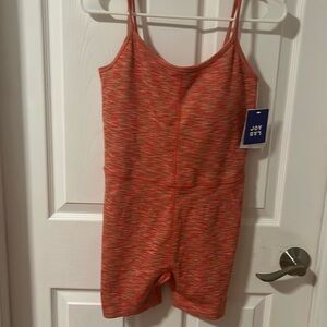 NWT pink/peach women’s bodysuit. Built in shelf bra. Size XL.